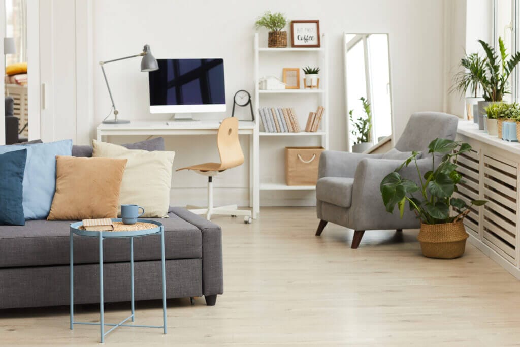 cozy apartment interior grey white colors focus modern sofa with decor elements